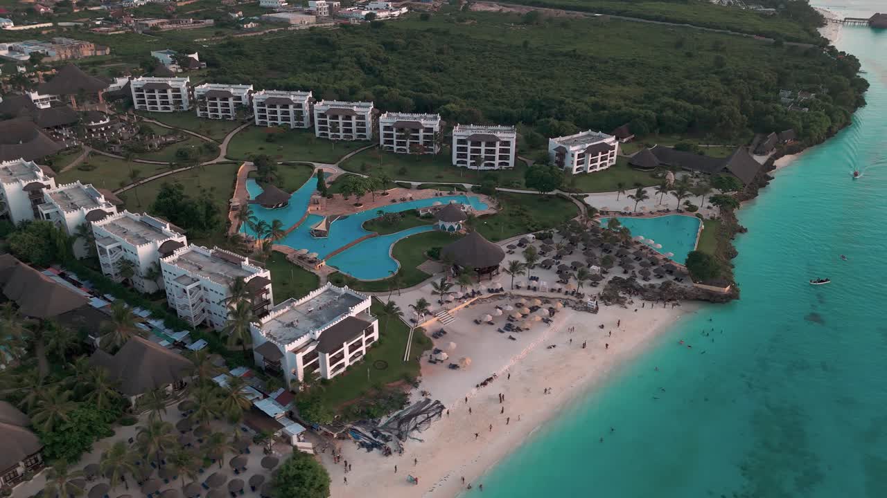 Beach Resort With Luxury Hotels In Nungwi, Zanzibar, Tanzania. - aerial shot