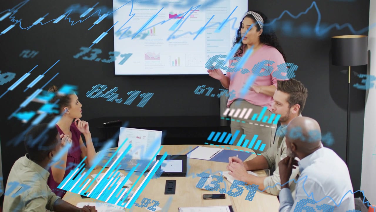 Presenter pointing, explaining business charts in meeting, blue graphs drifting across participants