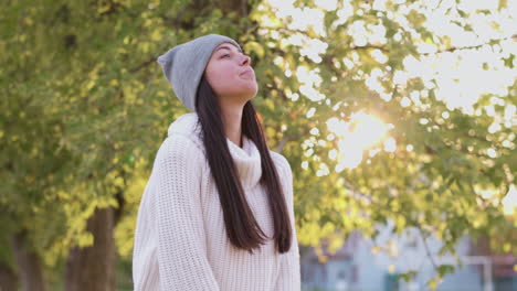 Relaxed-Woman-Breathing-Fresh-Air-Standing-In-The-Park-In-Autumn-1