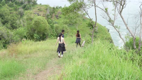 friends hiking along coastal trail