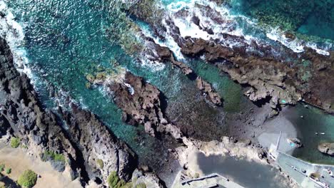 costa adeje, tenerife south in canary islands, spain aerial drop down view