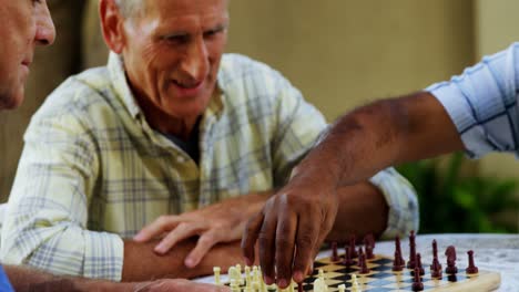 Senior-friends-playing-chess-4k