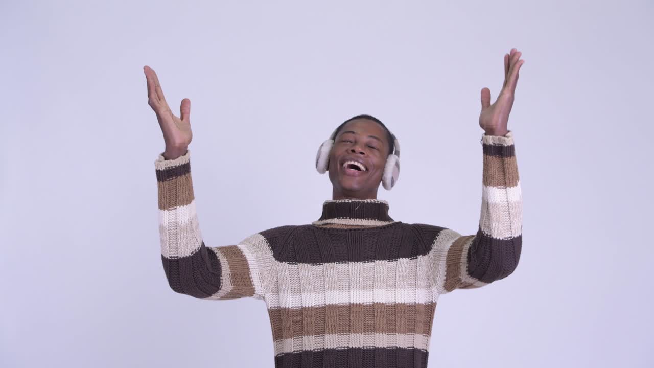 Young handsome African man ready for winter