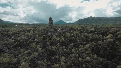 FPV-DRONE-SHOT-OF-PARICUTIN-VOLCANO-DESTROYED-CHURCH-IN-MICHOACAN