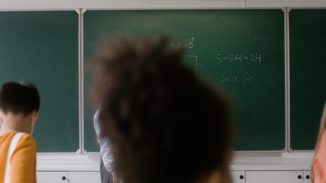 Teacher and students at the end of the class.