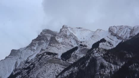 slow pan of big snowed mountains in the banff national park, canada