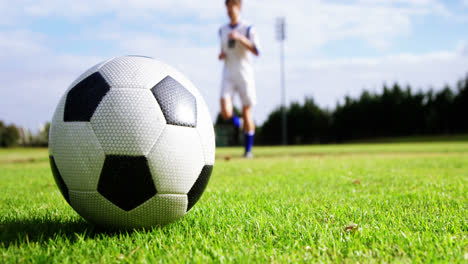 Football-player-warming-up-in-the-field