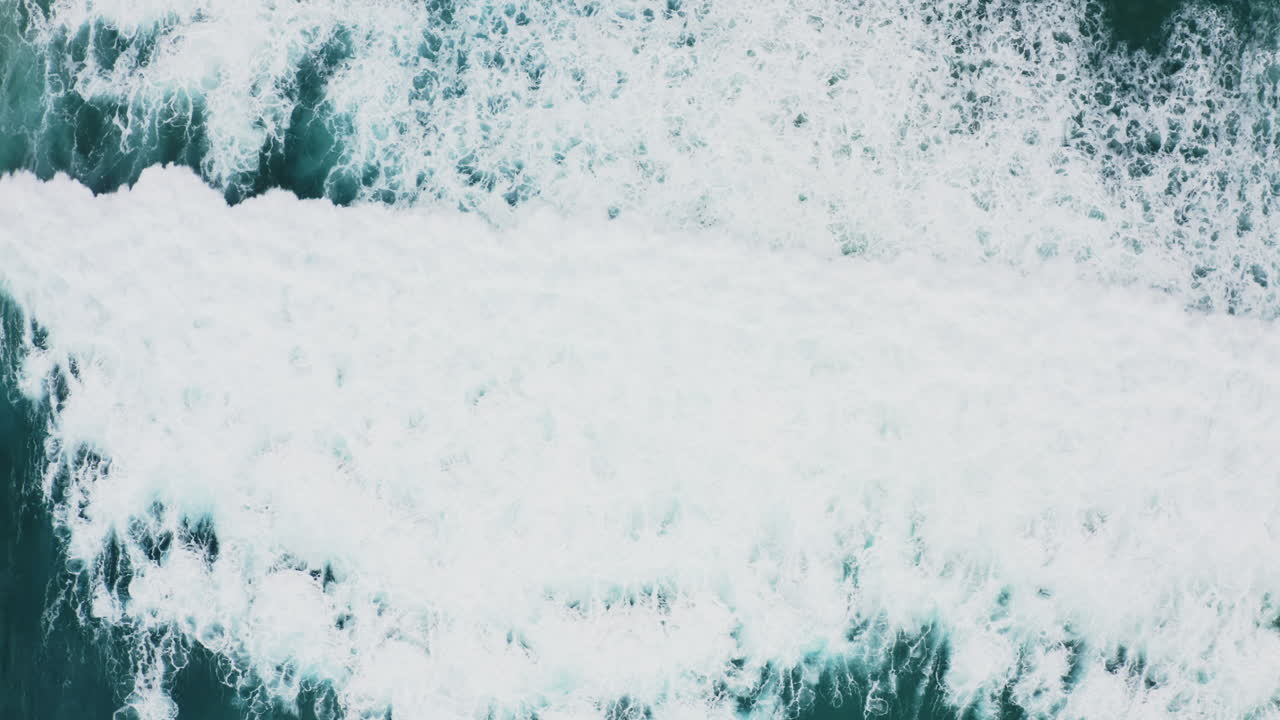 Aerial Shot Of Blue Ocean Waves During Winter Relax Time
