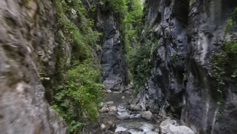 walking canyon river aerial drone flying