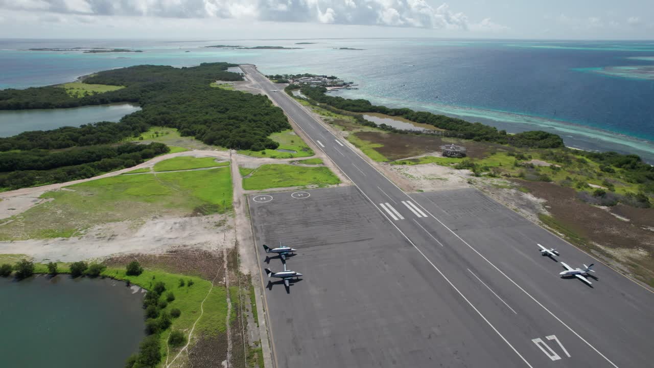 Aerial view over a scenic runway by the ocean in Los Roques, Venezuela