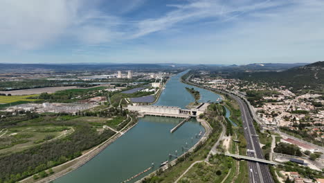aerial vista: donzère-mondragon dam, a historic powerhouse of hydro, wind,
