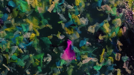 plastic bags pollution floating on ocean surface