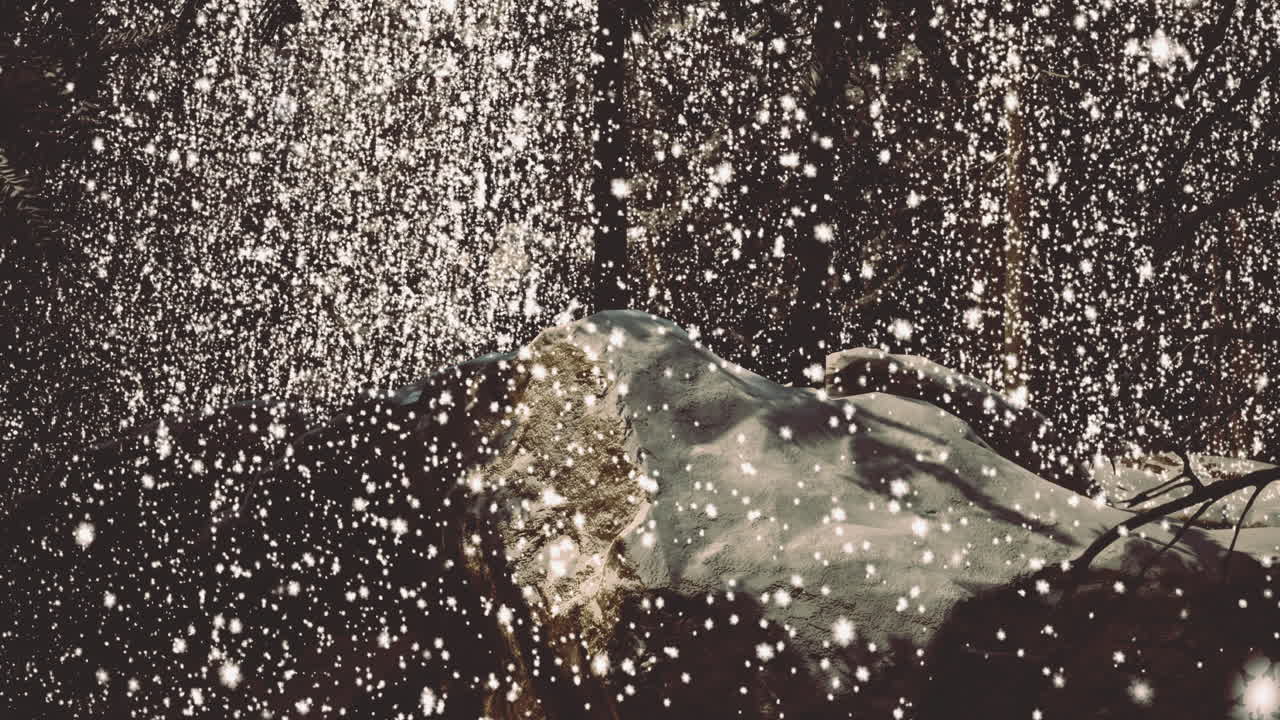 Natural waterfall cascading over rocks surrounded by lush greenery