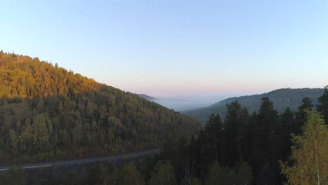 Flying-Over-Autumn-Forest-to-Enchanting-Valley