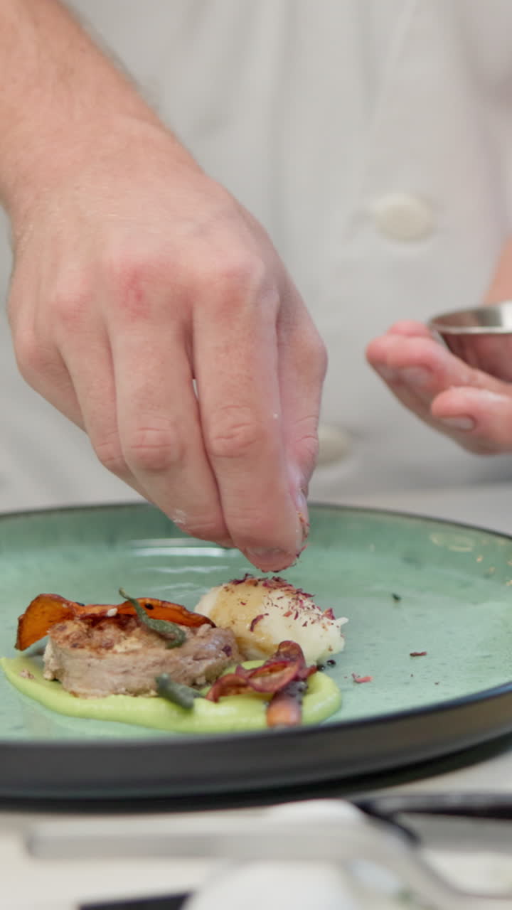 Chef plating a gourmet dish