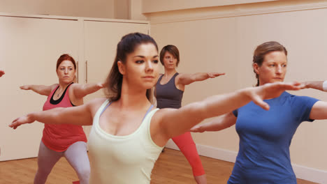 Group-of-people-performing-stretching-exercising