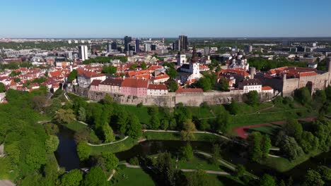 Amazing-Aerial-View-Above-Walls-of-Tallinn-Protecting-Historic-Old-Town-City-Centre