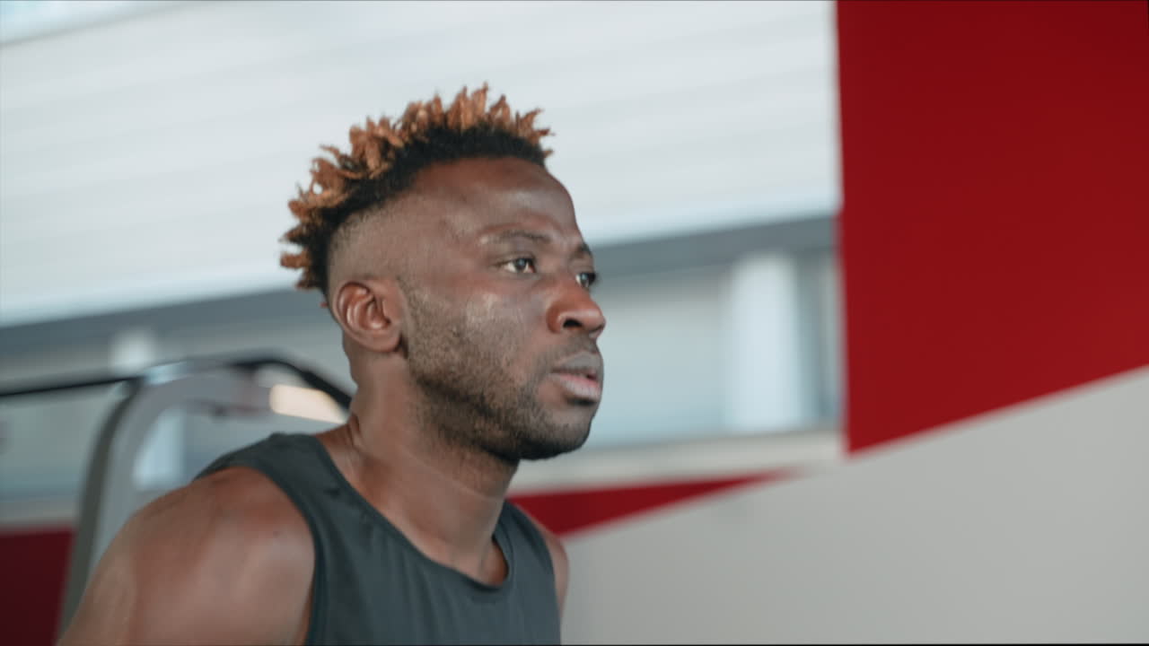 Man Running on Treadmill