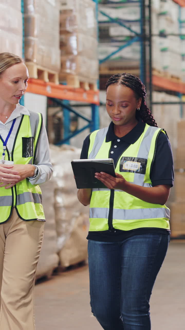 Warehouse Employees Discussing Logistics