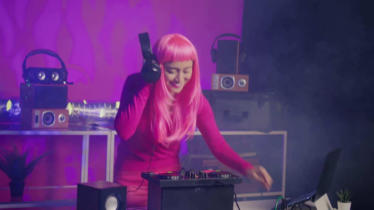 DJ with Pink Hair Performing