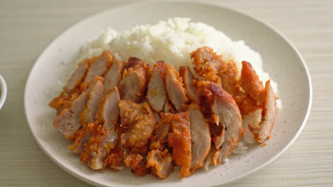 fried pork topped on rice with spicy dipping sauce