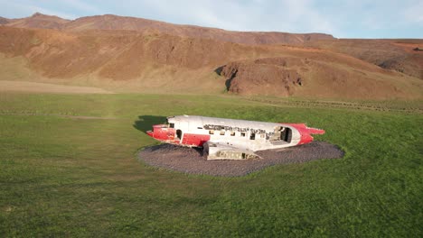 aerial view of the dc-3 airplane wreck in eyvindarholt along the ring road in iceland during summer