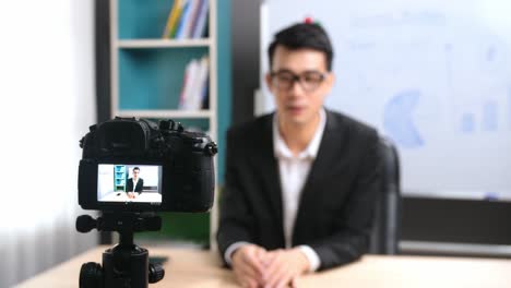 asian business man recording video