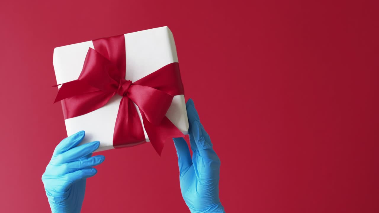 pandemic surprise covid-19 holidays hands gift box