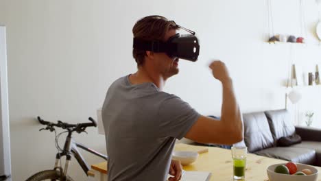 man using virtual reality headset in living room 4k