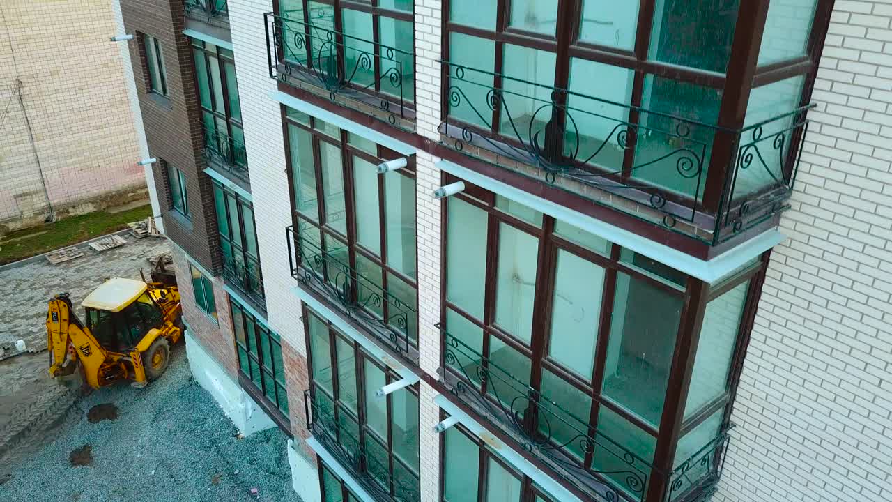 Buildings construction in process. High buildings under construction in new district