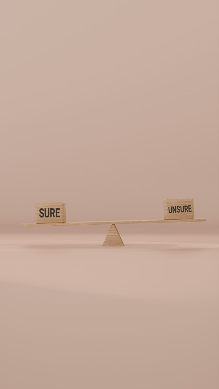 VERITCAL VIDEO OF SURE AND UNSURE BALANCING ON SEESAW