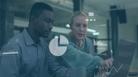 Animation of data processing over diverse man and woman discussing over laptop at office