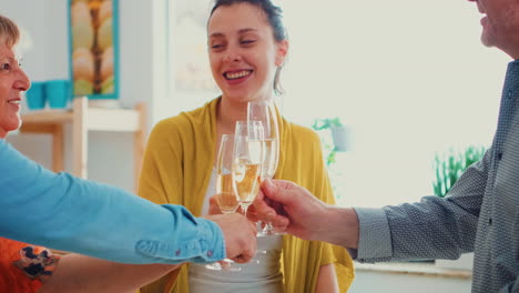 family enjoying a glass of wine