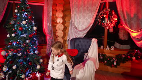 girls playing during christmas. two girls having fun during christmas eve