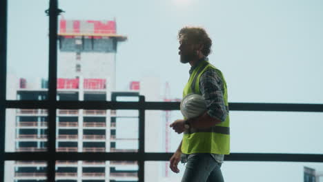 construction engineer observing building site