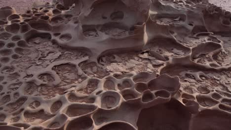 pan right close up of tafoni formations in a clay pan in namibia