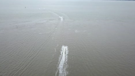 drone flying over a river in delaware