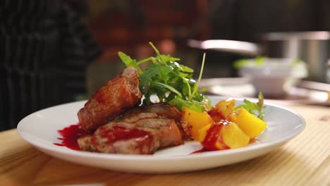 grilled pork chops with peach sauce and roasted vegetables