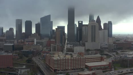 aerial view of downtown houston on a rainy and gloomy day