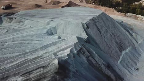 gravel pile at a quarry site with aerial view