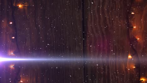 animación de senderos de luz y nieve cayendo sobre las luces de hadas en navidad