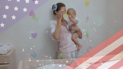 Animation-of-flag-of-usa-and-confetti-over-happy-caucasian-mother-playing-with-baby