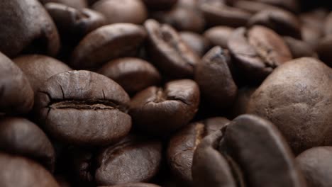 close-up detail of roasted coffee beans. probe lens