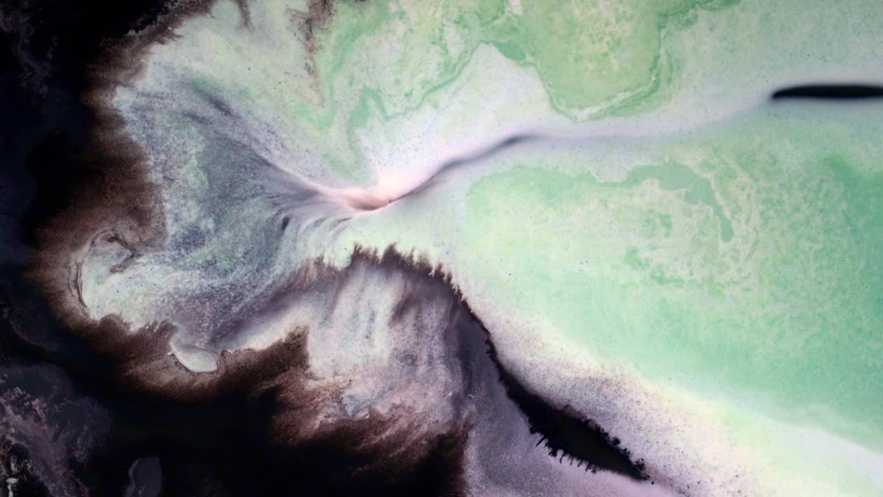 Aerial abstraction of flowing textures and earthy tones, evoking natural landscapes and organic transformation