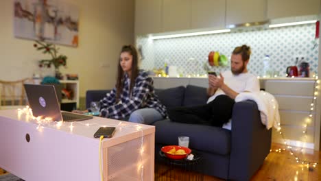 couple relaxing at home watching movie