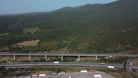 highway through mountains with trucks