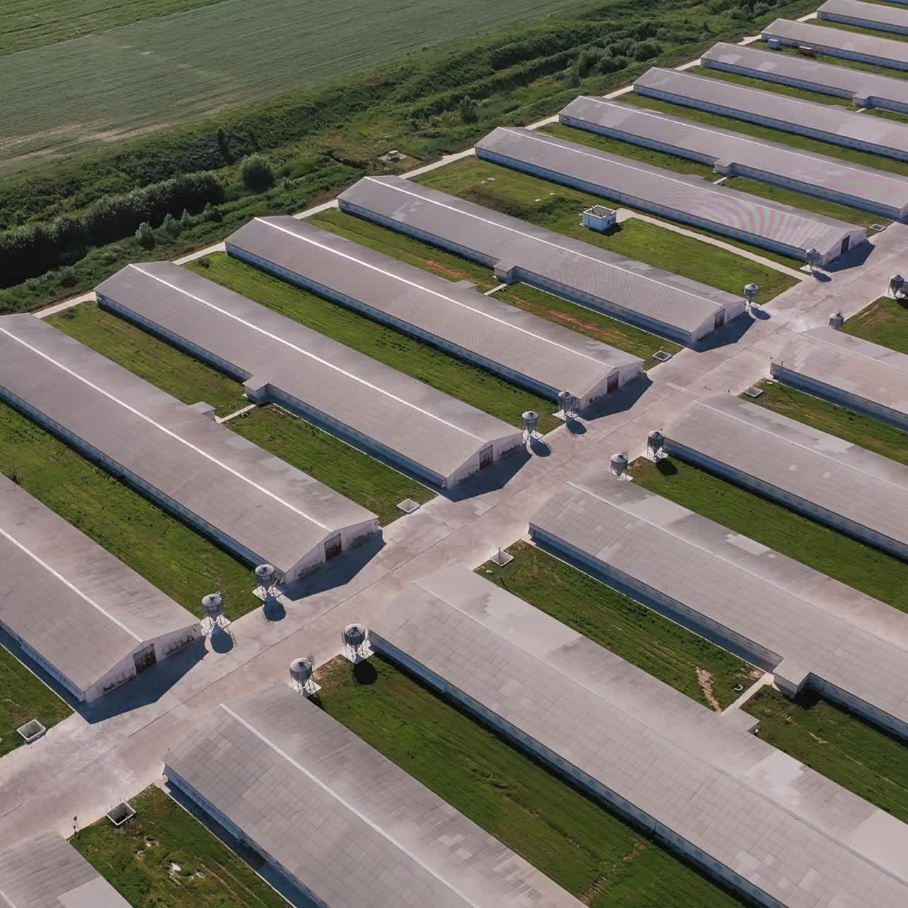 Industrial aerial view hangars. Technology modern countryside farming