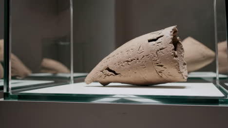 ancient pottery fragment in museum display
