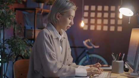 young woman working at a desk