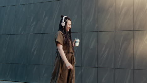 woman walking and listening to music